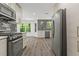 Kitchen with stainless steel appliances, and stylish backsplash at 4331 Volnay Ne Ct, Marietta, GA 30066
