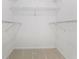 Functional walk-in closet is equipped with wire shelving for seamless organization of personal items at 4331 Volnay Ne Ct, Marietta, GA 30066