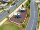 Playground featuring modern equipment, safety surfacing, and shaded seating areas in a Gathering-friendly neighborhood at 1010 Fendley St, Woodstock, GA 30188