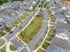The community has a central park with playground, walking trails, and manicured green spaces at 1010 Fendley St, Woodstock, GA 30188