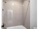 Close up view of bathtub and shower featuring gray subway tile at 1010 Fendley St, Woodstock, GA 30188