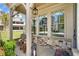 A welcoming front porch featuring comfortable chairs and classic stone detailing at 1010 Fendley St, Woodstock, GA 30188