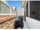 Outdoor area with grill beside fenced yard on brick paved patio, great for entertaining and cookouts at 1010 Fendley St, Woodstock, GA 30188