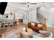Open-concept space showcasing a living room with dining area and kitchen at 1010 Fendley St, Woodstock, GA 30188