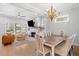 Open-concept space showcasing a living room with dining area and kitchen at 1010 Fendley St, Woodstock, GA 30188