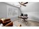 Home office featuring natural lighting, a ceiling fan, and attractive furniture at 1010 Fendley St, Woodstock, GA 30188