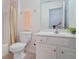 Clean bathroom features a white vanity and neutral shower curtain, creating a fresh and tidy space at 2595 Grapevine Cir, Cumming, GA 30041