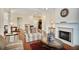 Comfortable living room with a fireplace, providing a relaxing area for gatherings at 2595 Grapevine Cir, Cumming, GA 30041