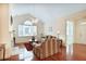 Inviting living room with vaulted ceilings, fireplace, and hardwood floors at 2595 Grapevine Cir, Cumming, GA 30041