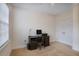 Bright and airy office with great natural light, modern desk, and neutral color walls at 2595 Grapevine Cir, Cumming, GA 30041