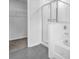 Bathroom showing a tiled shower, separate soaking tub, and a walk-in closet at 2789 Aralynn Way, College Park, GA 30337