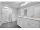 Contemporary bathroom with double sinks, a glass-enclosed shower, and modern fixtures at 2789 Aralynn Way, College Park, GA 30337