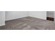Carpeted bedroom featuring neutral colors and an open doorway at 2789 Aralynn Way, College Park, GA 30337