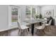 Modern dining area with table, chairs, and natural light at 2789 Aralynn Way, College Park, GA 30337