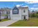 Charming two-story home with white brick and a two-car garage at 2789 Aralynn Way, College Park, GA 30337