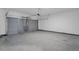 Spacious garage with gray concrete floor and large sectional garage door at 2789 Aralynn Way, College Park, GA 30337