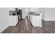 Open concept kitchen with stainless steel appliances and breakfast bar at 2789 Aralynn Way, College Park, GA 30337