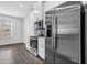 Bright, modern kitchen with stainless steel appliances and white cabinetry at 2789 Aralynn Way, College Park, GA 30337