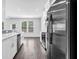 Modern kitchen design with stainless appliances and open floorplan to living area at 2789 Aralynn Way, College Park, GA 30337