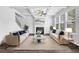 Bright living room with coffered ceiling, fireplace, and large windows at 2789 Aralynn Way, College Park, GA 30337