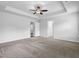 Expansive main bedroom with tray ceilings, carpet, and ample natural light at 2789 Aralynn Way, College Park, GA 30337