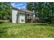 Large home with manicured lawn and inviting deck at 3295 Waters Ml, Alpharetta, GA 30022