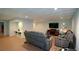 Finished basement with recreation area, media center, recessed lighting and modern flooring at 3295 Waters Ml, Alpharetta, GA 30022