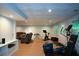 Finished basement with gym, entertainment space and modern flooring at 3295 Waters Ml, Alpharetta, GA 30022