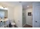 Bathroom with a vanity, glass-enclosed shower, and modern fixtures; conveniently located near the bedroom at 3295 Waters Ml, Alpharetta, GA 30022