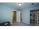 Bright bedroom features carpet, organized closet, and easy access to other rooms at 3295 Waters Ml, Alpharetta, GA 30022