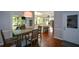 Open-concept kitchen with island, stainless steel appliances, and adjacent dining area for casual meals at 3295 Waters Ml, Alpharetta, GA 30022