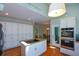Spacious kitchen with an island cooktop, double ovens, and extensive white cabinetry at 3295 Waters Ml, Alpharetta, GA 30022