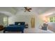 Large main bedroom featuring a blue bed, tray ceiling and ample lighting at 3295 Waters Ml, Alpharetta, GA 30022