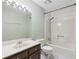 Bathroom featuring a single sink vanity with a bathtub and shower combo at 4938 Cedar Lake Ter, Douglasville, GA 30135
