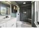 Stylishly renovated bathroom with modern fixtures and a tiled shower, a calming retreat at 1712 Grist Mill Dr, Marietta, GA 30062