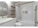 Bright bathroom featuring white subway tile, decorative shelving, and a modern vanity at 1712 Grist Mill Dr, Marietta, GA 30062