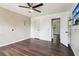 Spacious bedroom with ceiling fan and hardwood floors, perfect for relaxing and unwinding at 1712 Grist Mill Dr, Marietta, GA 30062