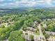 Aerial view of a wooded residential community, showcasing neighborhood layout at 1712 Grist Mill Dr, Marietta, GA 30062
