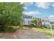 Charming townhouse with a well-manicured lawn and inviting front entrance, perfect for a Gathering or first-time homeowner at 1712 Grist Mill Dr, Marietta, GA 30062