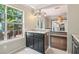 Open-concept kitchen with granite countertops, stainless appliances, and a deck view at 1712 Grist Mill Dr, Marietta, GA 30062