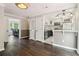 Open floor plan of living and kitchen spaces featuring stainless steel appliances and modern design at 1712 Grist Mill Dr, Marietta, GA 30062