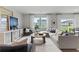 Bright and airy living room with modern decor, comfortable seating, and ample natural light at 2010 Moonlight Path, Covington, GA 30016