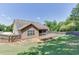 Expansive backyard showcasing a multi-tiered wooden deck, screened porch, and well-maintained lawn, perfect for outdoor enjoyment at 2906 Jones Phillips Rd, Dacula, GA 30019