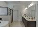 A primary bathroom featuring tile floors, soaking tub, and glass shower at 2906 Jones Phillips Rd, Dacula, GA 30019