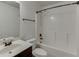 A bathroom featuring a vanity, toilet, and tub with shower at 2906 Jones Phillips Rd, Dacula, GA 30019