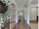 Inviting foyer with hardwood floors, arched doorways, and elegant decor at 2906 Jones Phillips Rd, Dacula, GA 30019