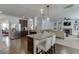 Open kitchen with granite island, stainless appliances, and view of living area at 2906 Jones Phillips Rd, Dacula, GA 30019