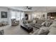 Bright living room with large windows, comfortable seating, and modern decor at 2906 Jones Phillips Rd, Dacula, GA 30019