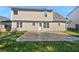 Spacious backyard with a large paved patio, perfect for outdoor entertaining at 3479 Woodruff Ridge Ln, Loganville, GA 30052