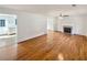 Bright living room with hardwood floors and fireplace at 3479 Woodruff Ridge Ln, Loganville, GA 30052